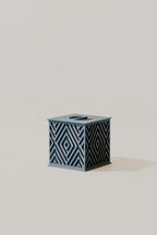 Beautiful memorial urn with geometric pattern on a light gray background