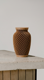 Woven texture brown memorial urn on a wooden surface with a neutral background